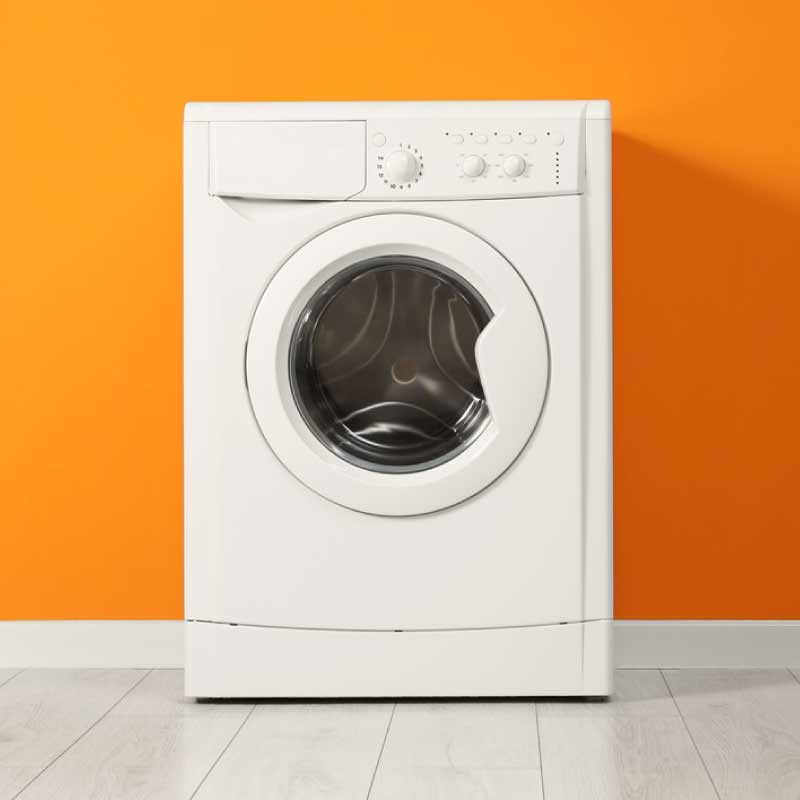 Washing machine repair carried out in a kitchen
